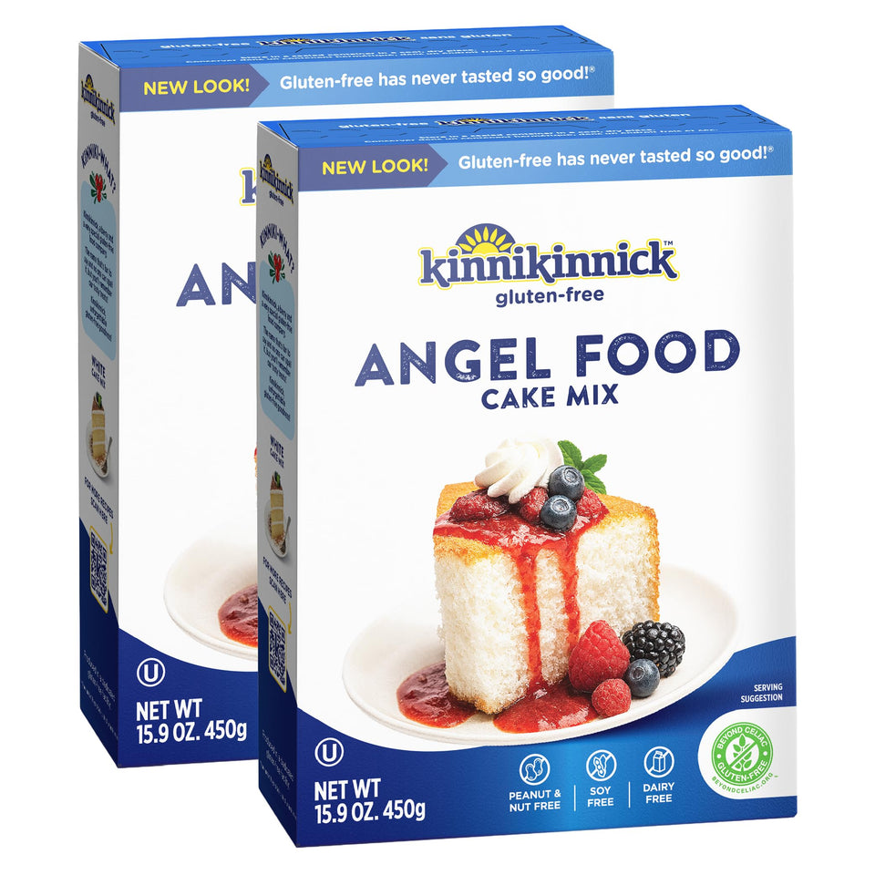 Kinnikinnick Angel Food Cake Mix box front highlights gluten-free baking potential.