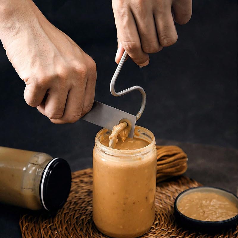 Two Kirkland Organic Peanut Butter jars on the counter