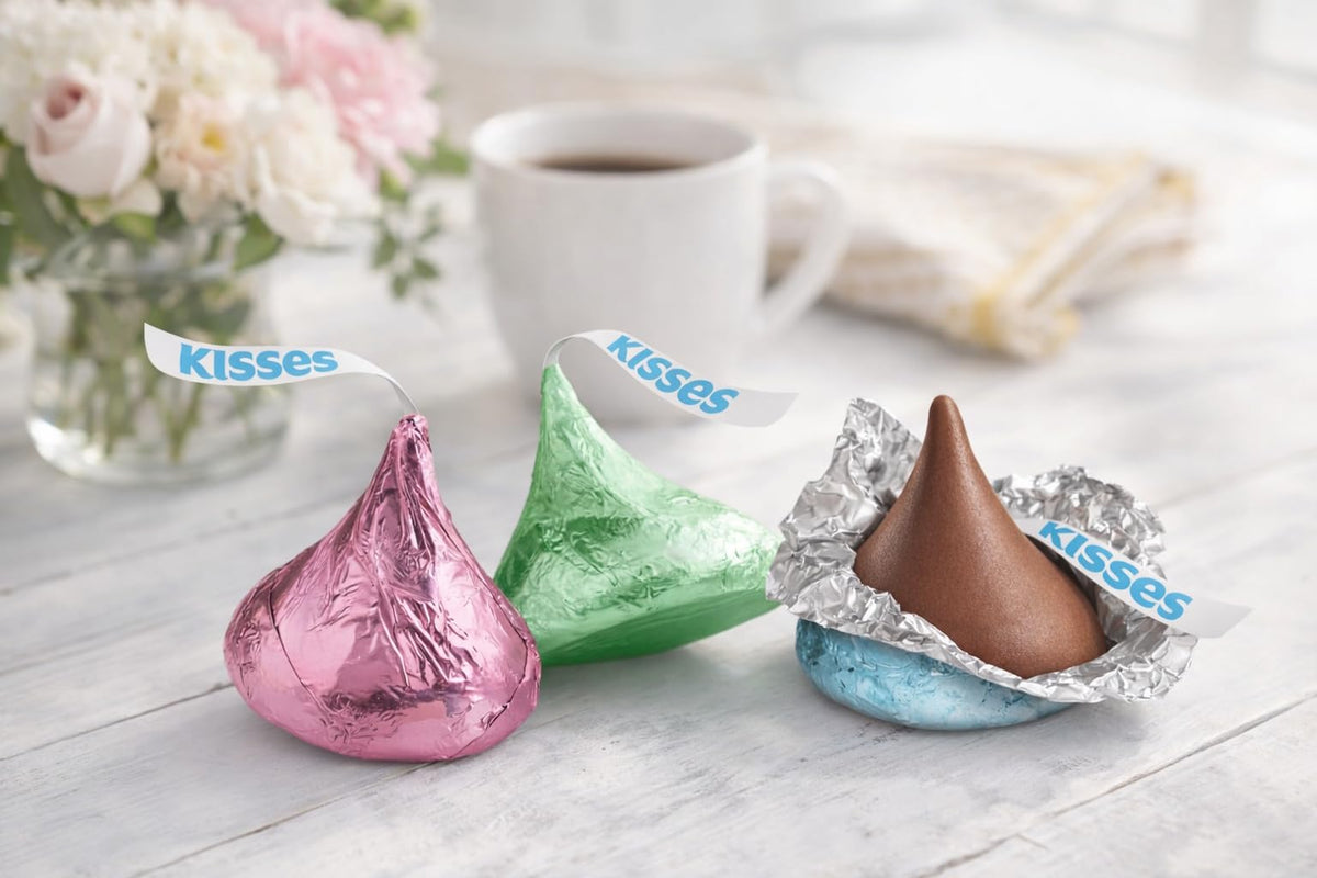 Kisess milk chocolate green foil chocolates for festive treats and party favors.