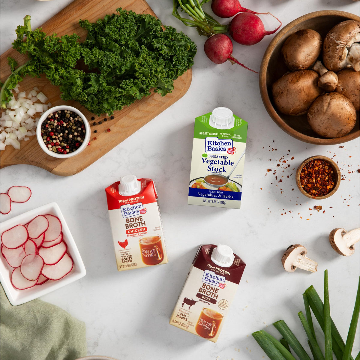 Kitchen Basics Unsalted Vegetable Stock carton pour into a pot for rich flavor.
