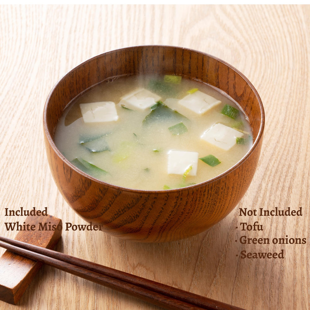 Steaming bowl of Kitchen Kurume white miso soup highlighting warmth and comfort