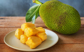Kitchen and Love Jackfruit Sweet BBQ as a pizza topping adds smoky flavor.