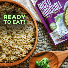 Kitchen & Love riced broccoli in a ready-to-heat bowl showcases a simple meal base.
