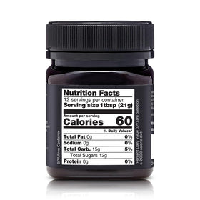Kiva Raw Manuka Honey UMF 15+ badge close-up signals high-grade sweetness.