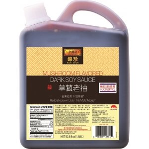 Lee Kum Kee LKK Mushroom Flavored Dark Soy Sauce bottle adds rich depth to stir-fries and braises.