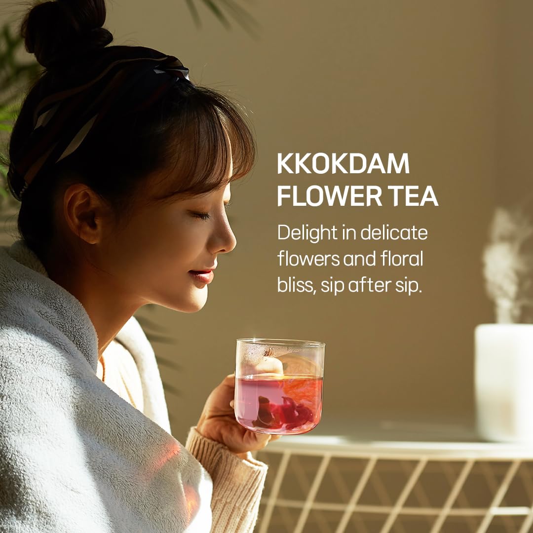 KKOKDAM blooming tea in a cup, watching petals unfurl for fragrant moments.
