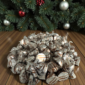 KLUB BULK Meltaway Milk Chocolate Kiss atop ice cream or desserts for extra chocolatey flair.
