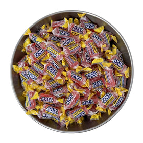 Party favors setup with KLUB BULK Jolly Ranchers Watermelon for Halloween.