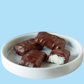 KLUB BULK Stevia-sweetened Coconut Chocolate piece, ideal for sugar-free indulgence.