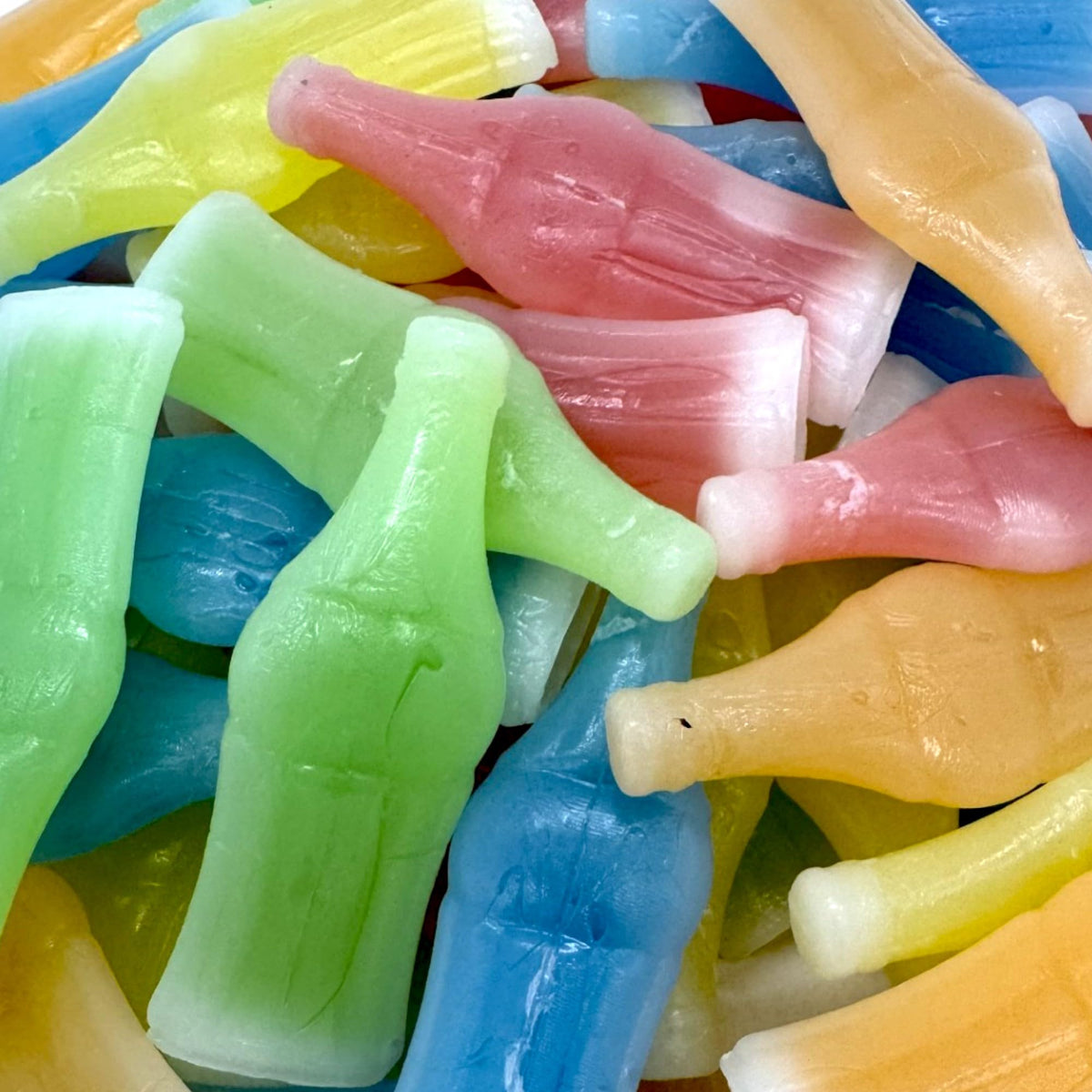 Klub Bulk Wax Bottle Candy orange juice close-up, great for gatherings