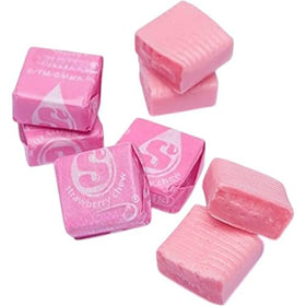 Close-up of a Starburst Pink Strawberry chewy candy piece highlighting fruity flavor.