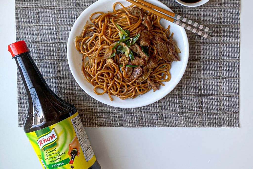 Bottle alongside spices, showcasing accessibility of Knorr liquid seasoning.