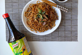 Bottle alongside spices, showcasing accessibility of Knorr liquid seasoning.