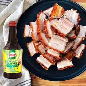 Kitchen scene with Knorr Liquid Seasoning Original on the counter.