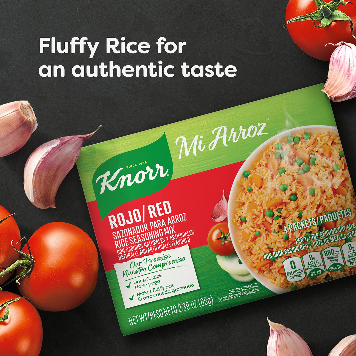 Knorr Mi Arroz red rice seasoning mix being used to cook rice in a pan
