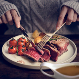 Knorr Roast Gravy family dinner scene, suggests everyday versatility.