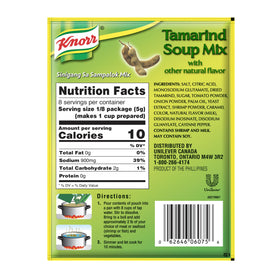Knorr Tamarind Soup Mix simmering pot with vegetables and seafood.