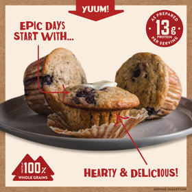 Golden Kodiak Cakes Blueberry muffins emerge from the oven with comforting aroma.