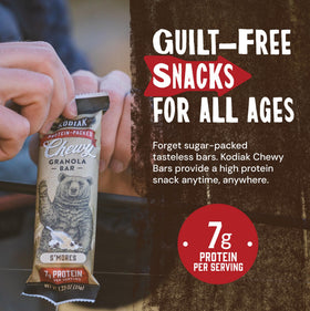 Close-up texture of Kodiak Cakes S'mores bar highlighting whole grains.