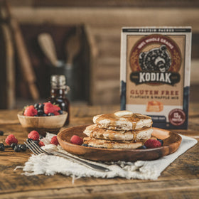 Kodiak Cakes Frontier Oat packaging on shelf, whole grains emphasis
