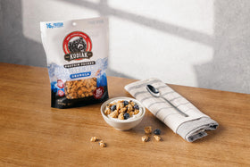 Kodiak Cakes Granola Blueberry Vanilla bowl with yogurt, crunchy topping option.