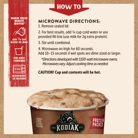 Warm Kodiak Cakes Cinnamon Roll Minute Muffins plated, convenient snack.