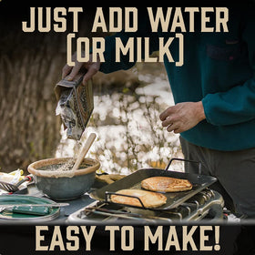 Kodiak Cakes Power Cakes pancakes on a hot griddle ready for fluffy breakfast