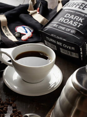 Koffee Kult brand logo displayed with premium organic blend messaging.