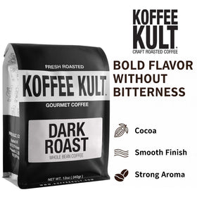 Koffee Kult dark roast aroma rises from beans beside a steaming cup.