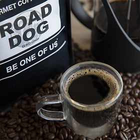 Koffee Kult Road Dog dark roast packaging and labels emphasizing freshness
