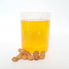 KOPABANA Akpi seed powder applied in skincare massage routines