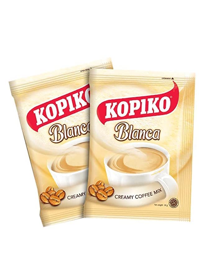 Kopiko Blanca instant coffee in cup highlighting creamy texture