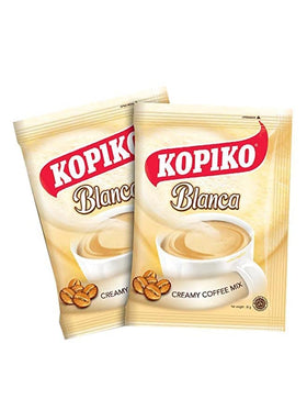Kopiko Blanca instant coffee in cup highlighting creamy texture