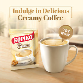Kopiko Blanca instant coffee sticks ready to dissolve for quick indulgence.
