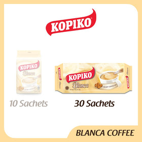 Kopiko Blanca cup being poured with hot water to reveal a smooth taste.