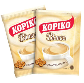 Kopiko Creamy Blanca sachet close-up showing creamy instant mix for fast coffee.