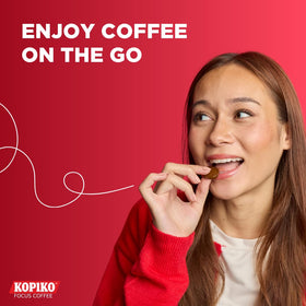 Close-up of glossy Kopiko Focus candy with rich coffee aroma.