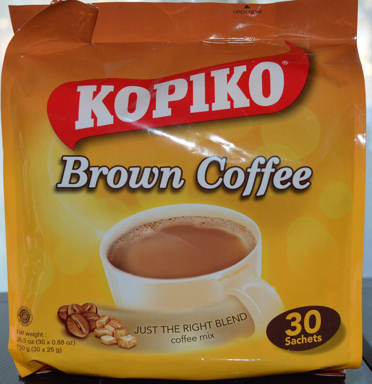 Kopiko Instant 3 in 1 brown coffee mix pack shot for quick, convenient single-serve coffee.