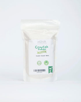 Kovafood African Ground Crayfish Powder being scooped for depth of flavor