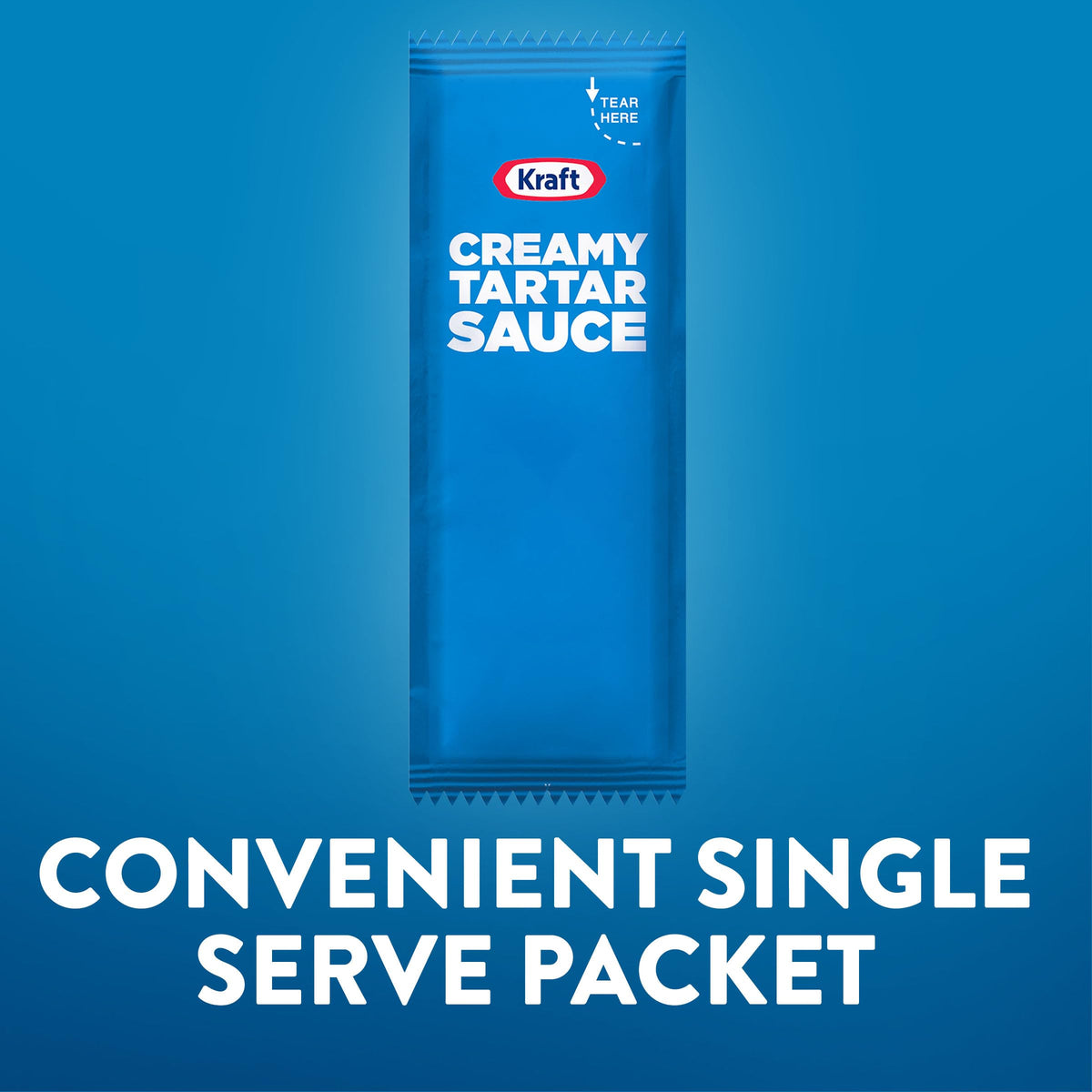 Kraft Creamy Tartar Sauce packet dipping action beside fish and fries.