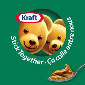Kraft Peanut Butter Smooth 2 kg jar beside cookies, ideal for baking.
