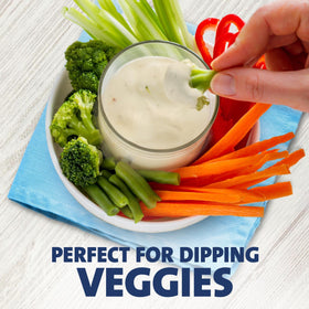 Kraft Ranch Dressing served with greens and entrees in a dining dish.