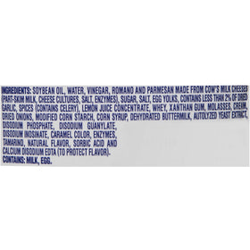Kraft Signature Creamy Caesar dressing packets arranged on a salad.