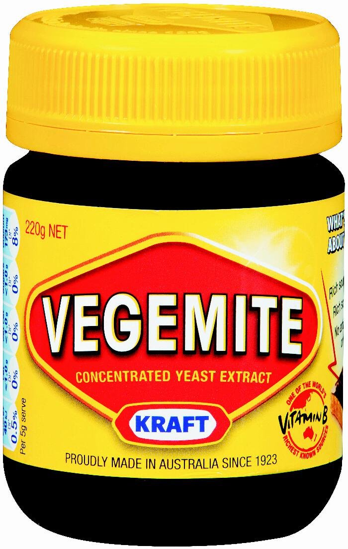 Kraft Vegemite 220g jar four-pack on pantry shelf, ideal savory spread for toast and sandwiches.