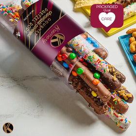 KREMERY white chocolate drizzle pretzel rod provides creamy contrast.