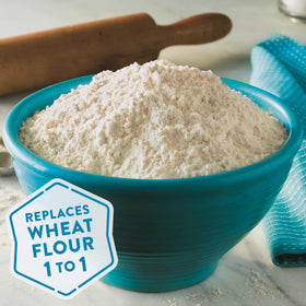 Krusteaz Gluten Free All-Purpose Flour scoop demonstrates 1:1 substitution potential