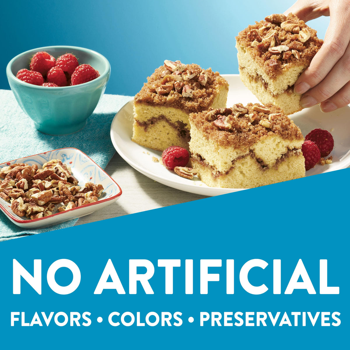 Krusteaz box open showing gluten free cinnamon swirl crumb cake mix for baking.