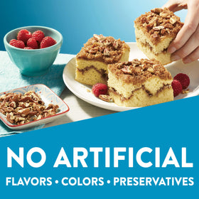 Krusteaz box open showing gluten free cinnamon swirl crumb cake mix for baking.