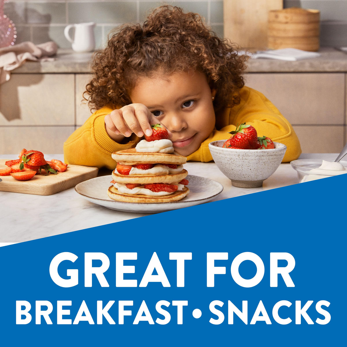 Krusteaz pancakes with berries provide a tasty breakfast upgrade.
