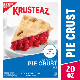 Rolled Krusteaz dough being shaped into a crust on the board.
